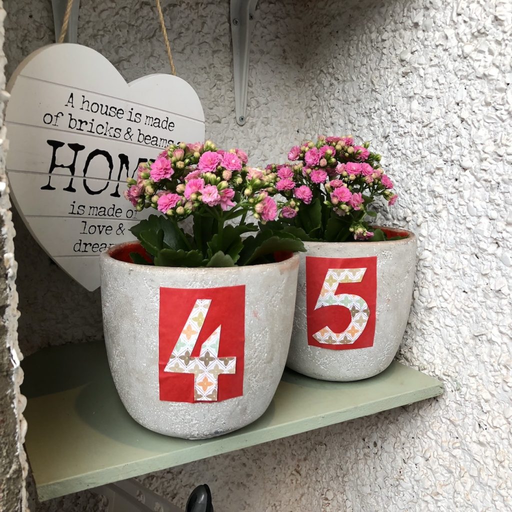 Plant pot door numbers