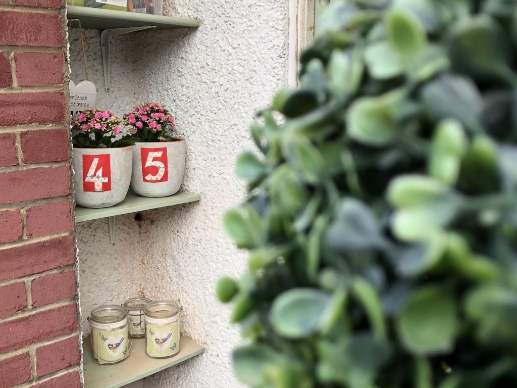 Plant pot door numbers